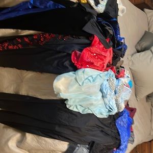 Collection of dance costumes in sizes CL or AS worn only for competitions